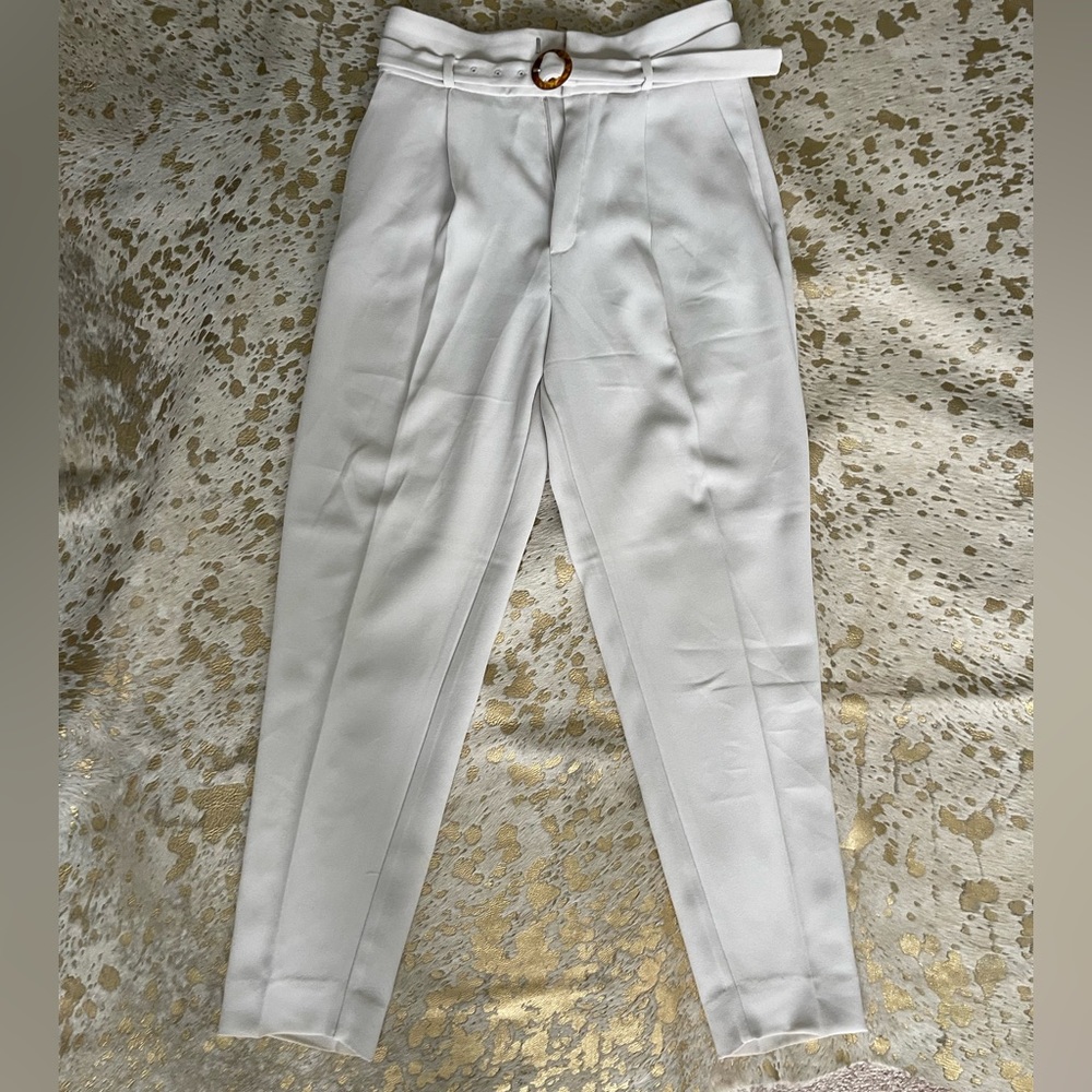 Cream colored cigarettes trousers